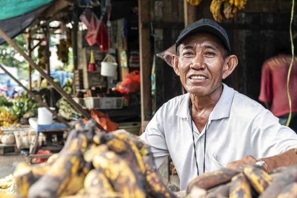 Fotos mit Fremden - Händler mit Bananen